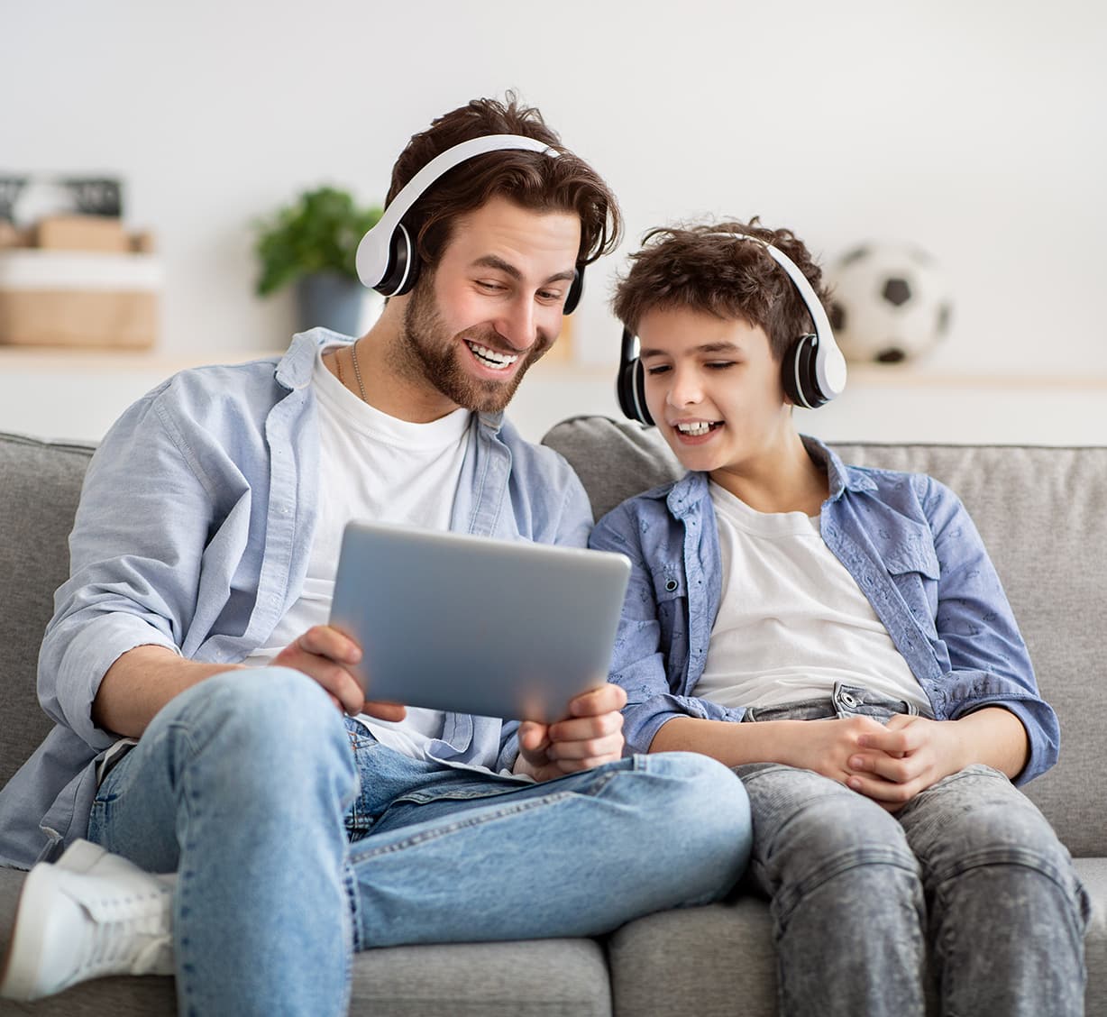 Father and son on couch