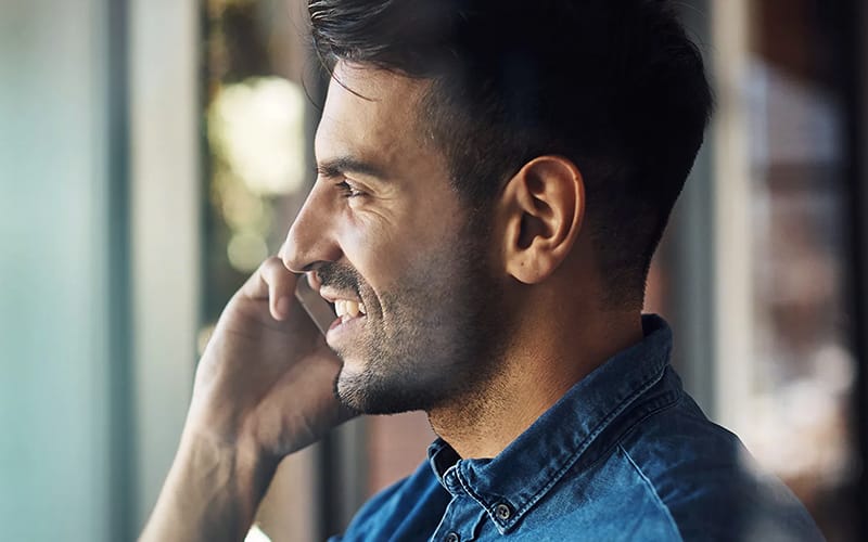 A Man is speaking on phone