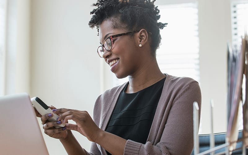 a woman using the phone